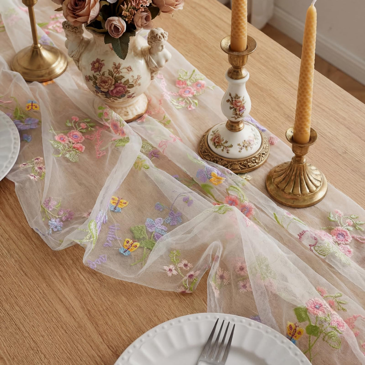 Windkream close-up shows detailed embroidery and lifelike floral textures.