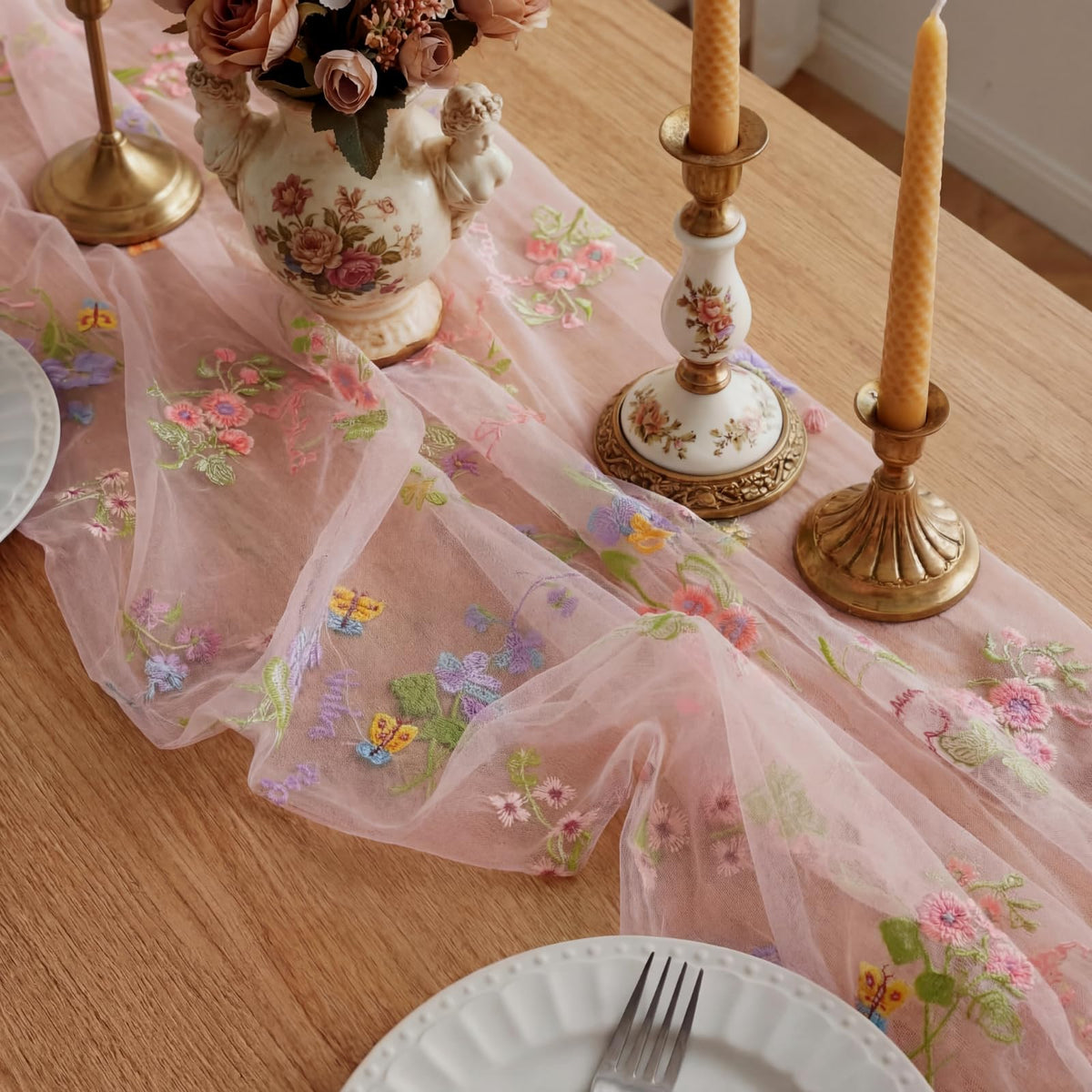 Windkream pink floral table runner with polyester flowers offering durable décor.