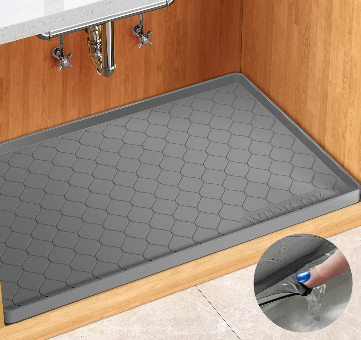 Winisok under-sink mat 37x22 provides cabinet coverage against leaks and spills.