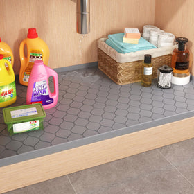 Winisok under-sink mat protecting cabinet surfaces from leaks
