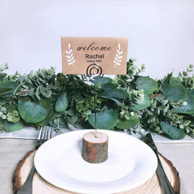 Winlyn swirl wire clip securely holds place cards without obstructing view