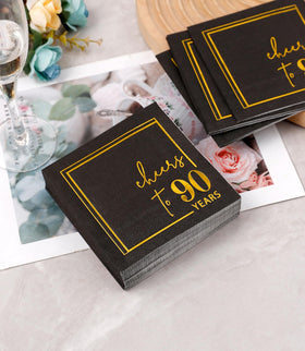 Winoo Design black and gold sparkle napkins elevate anniversary party table decor.