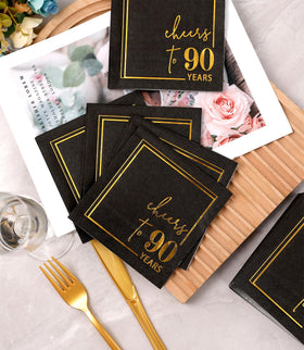 Winoo Design gold foil napkins pair with other black and gold accents.