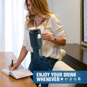 Silicone sleeve on WINSA tumbler protects glass and adds grip during travel