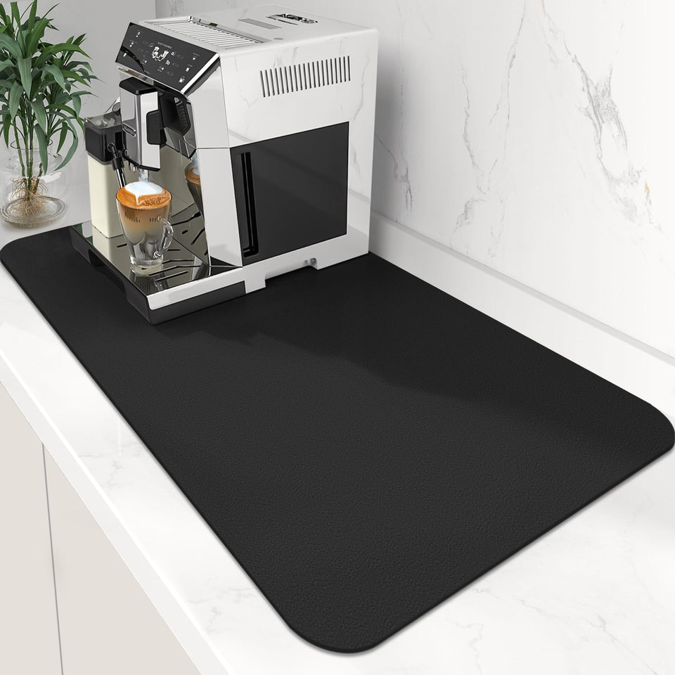 WISELIFE coffee mat under the coffee maker catching spills and stains.