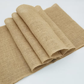 Wlirantim candy buffet table layout with burlap runners.