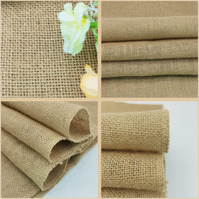Wlirantim farmhouse party table setup with burlap runners.