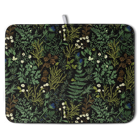 Wnoesat sage-green botanical dish drying mat with florals on a kitchen counter
