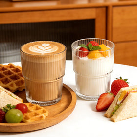 Woaiwo-q elegant ribbed design glass cups for stylish beverage presentation.