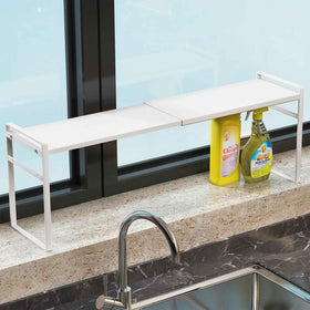 WOCHUANGSI windowsill shelf adds compact storage and keeps items within reach