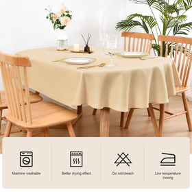 Wolkemer oval tablecloth on a dining set, perfect for formal dinners.