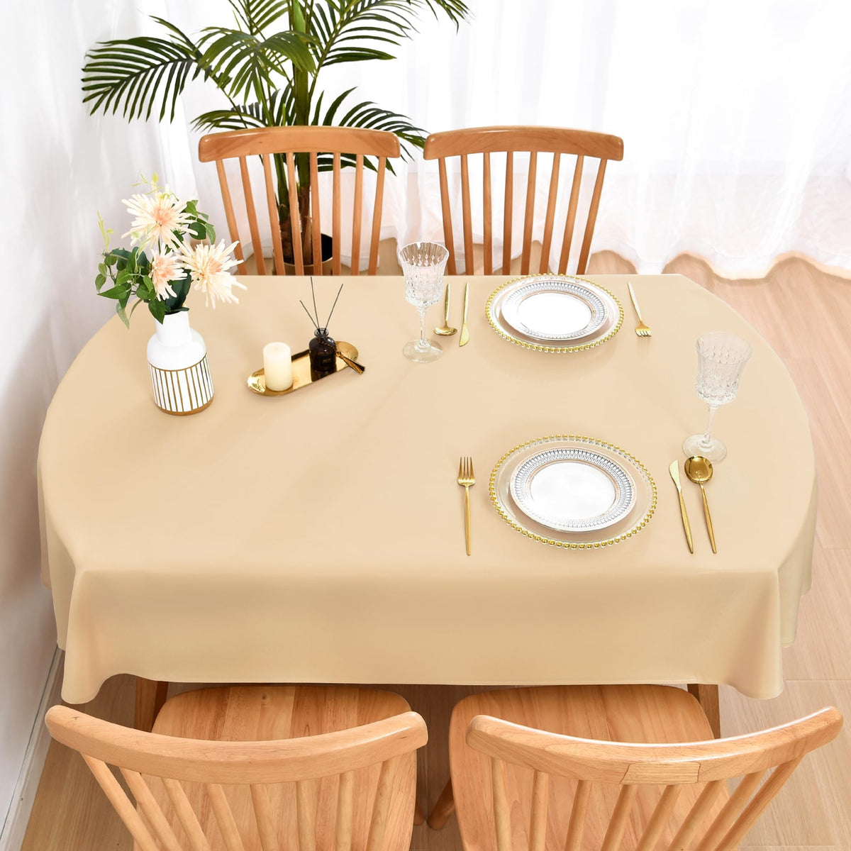 Wolkemer oval tablecloth texture reveals soft polyester drape for everyday elegance.