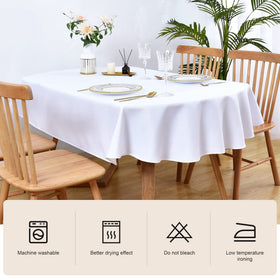 Wolkemer tablecloth draped on table demonstrates sophisticated dining setup.