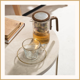 WOLTBLOOM Enchanti Tea Pot unfurling leaves inside the glass.