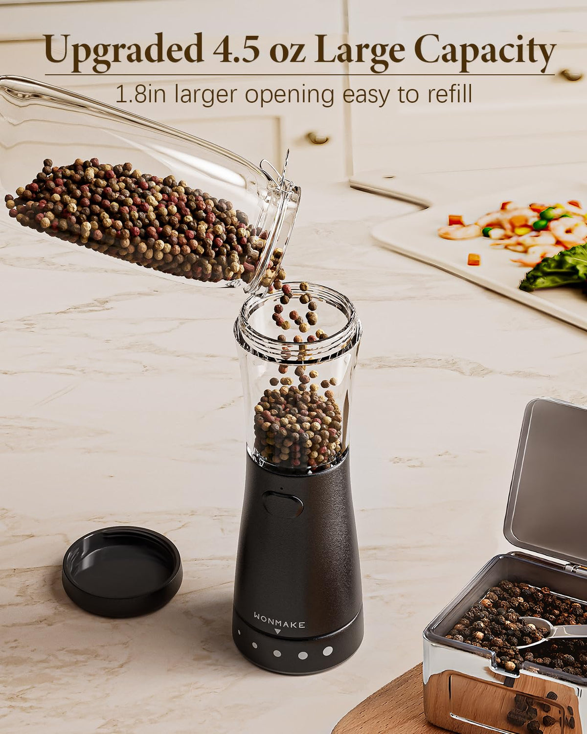 WONMAKE grinder in use with one hand for quick, controlled seasoning.