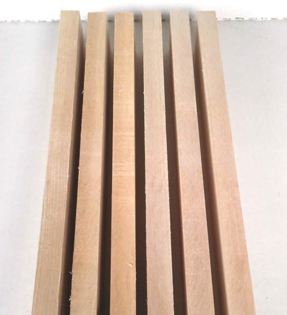 Wood-Hawk stacked boards close-up showing rich grain patterns.