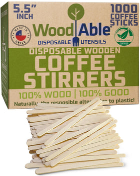WOODABLE stirrers in a cup ready to stir your coffee.