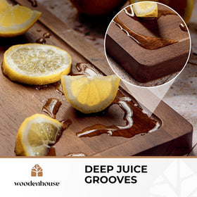 Woodenhouse acacia board with built-in handles for easy transport.