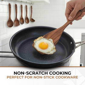 Woodenhouse spoons on hooks for convenient kitchen storage.