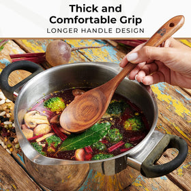 Woodenhouse teak serving spoon with smooth ergonomic grip.