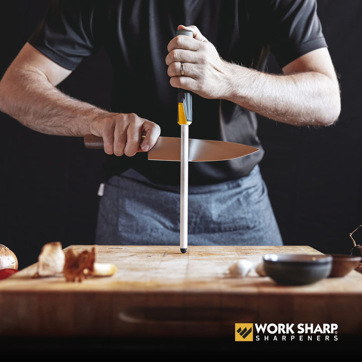 Durable ceramic surface on Work Sharp rod refines knife edges.