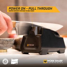 Work Sharp E2 in operation with push-button sharpening for quick prep.