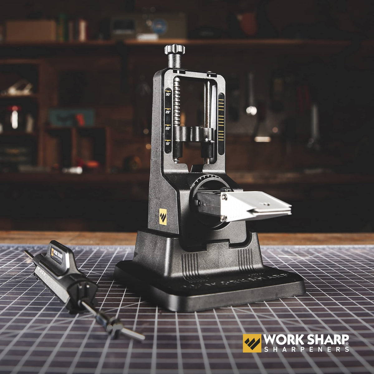 Work Sharp Precision Adjust Knife Sharpener shows a 3-sided abrasive jig for versatility