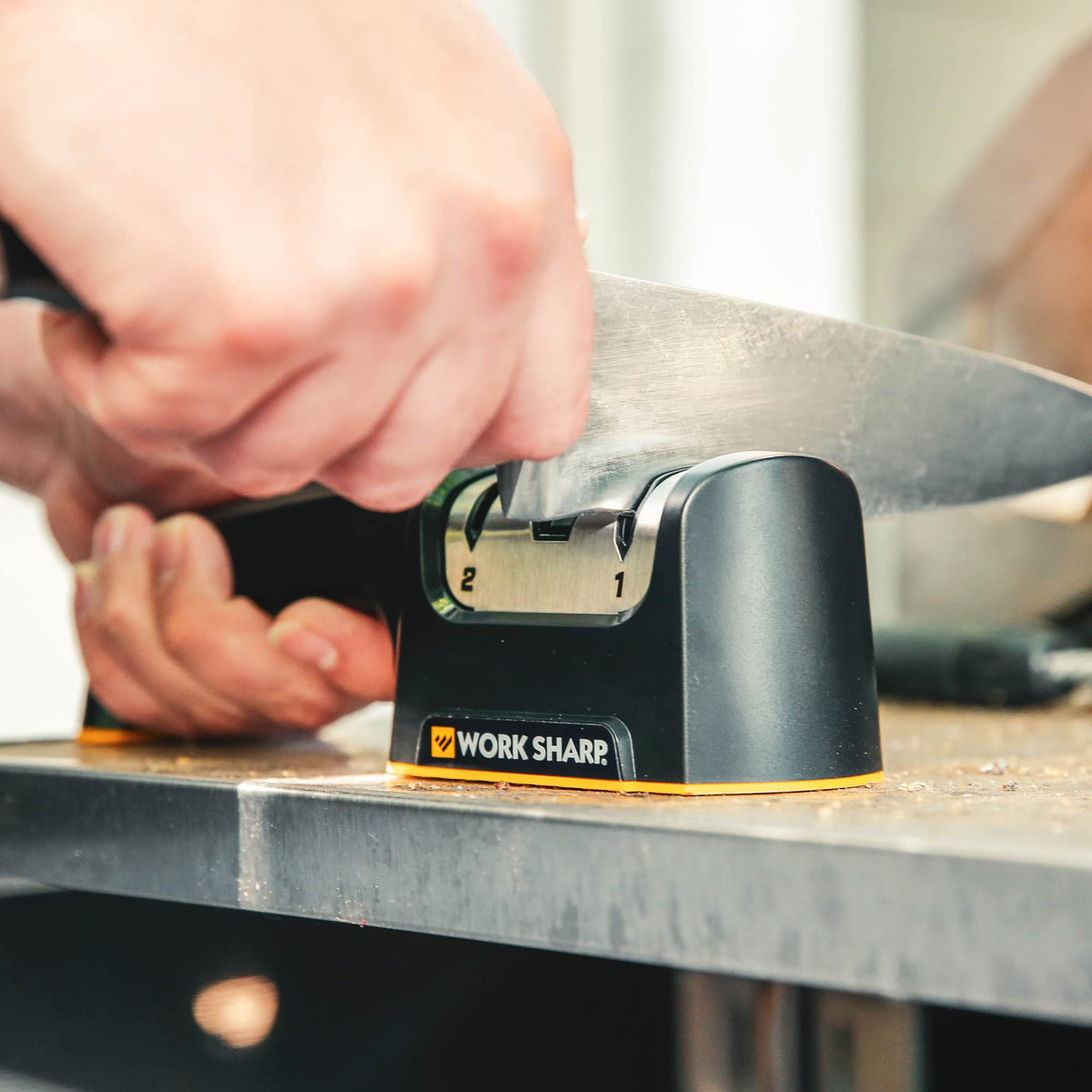 Serrated blade sharpened with Work Sharp Pull Through to improve grip on crusty bread.