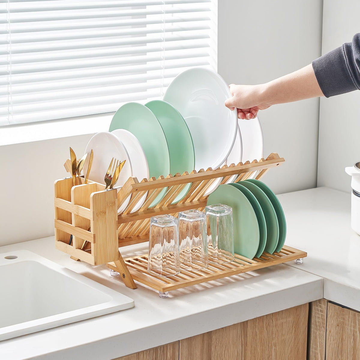 Worthyeah utensil holder on bamboo rack keeps cutlery accessible.