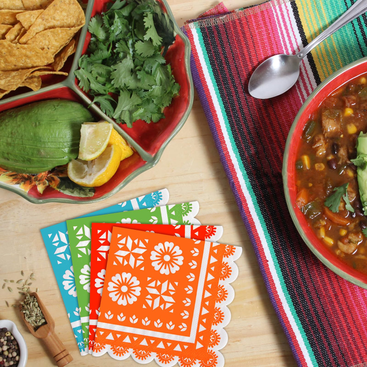 WQCI napkins feature Mexican-theme decor for festive tables.