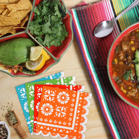 WQCI napkins feature Mexican-theme decor for festive tables.