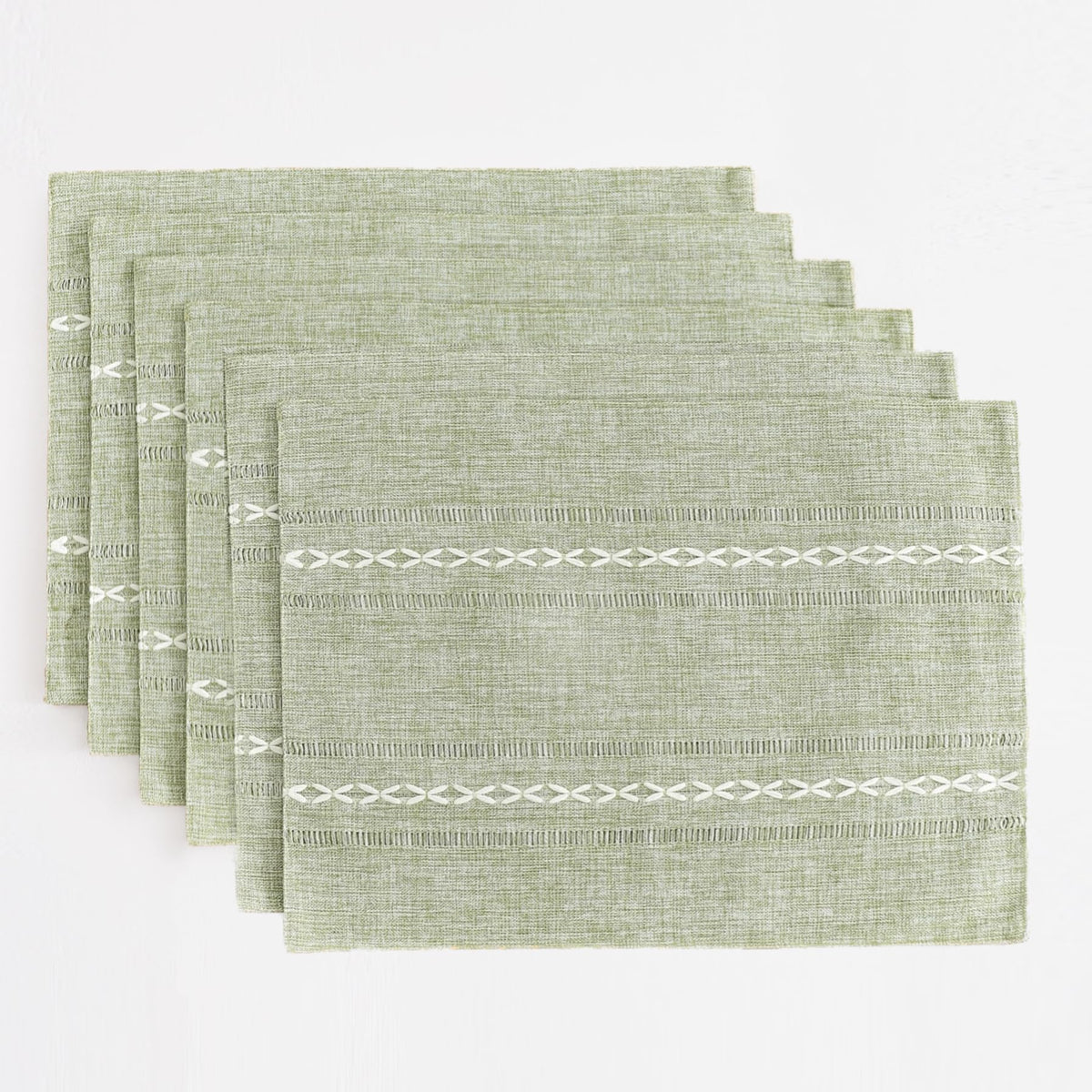 Wracra hemstitch sage green placemats on dining table for textural warmth