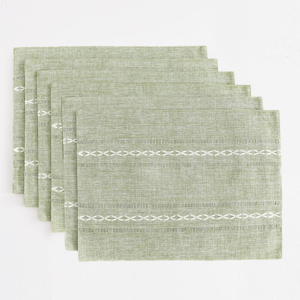 Wracra hemstitch sage green placemats on dining table for textural warmth