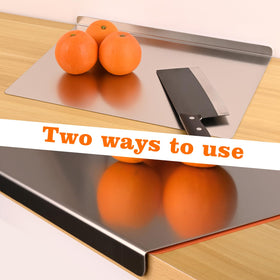 Wrbin serving bread on stainless board highlights dual side use and style.
