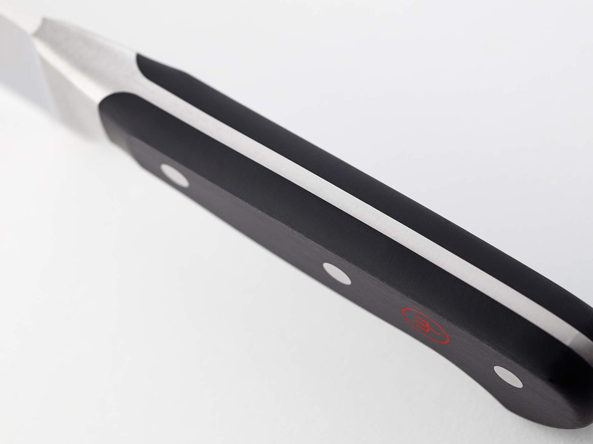 Wüsthof Classic 6-inch knife full tang visible for durability.