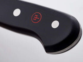Wüsthof Classic 6-inch knife precision forged blade for longevity.