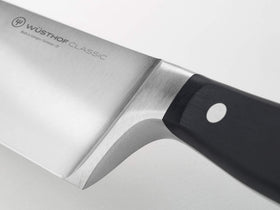 Wüsthof Classic 6-inch knife triple riveted handle for secure grip.