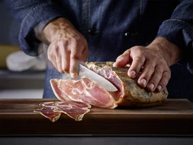 Wüsthof Classic series kitchen scene featuring chef's knife.