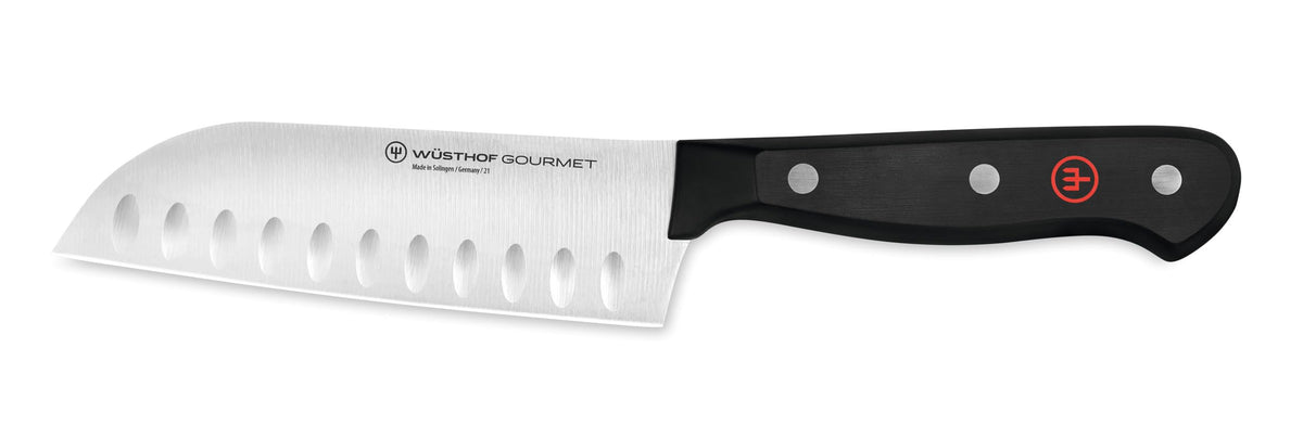 WÜSTHOF Gourmet 5-inch hollow edge santoku blade close-up for precise slicing.