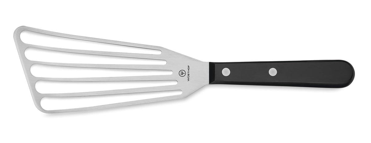 WÜSTHOF Gourmet offset spatula blade demonstrates razor-thin flexibility for delicate flipping.