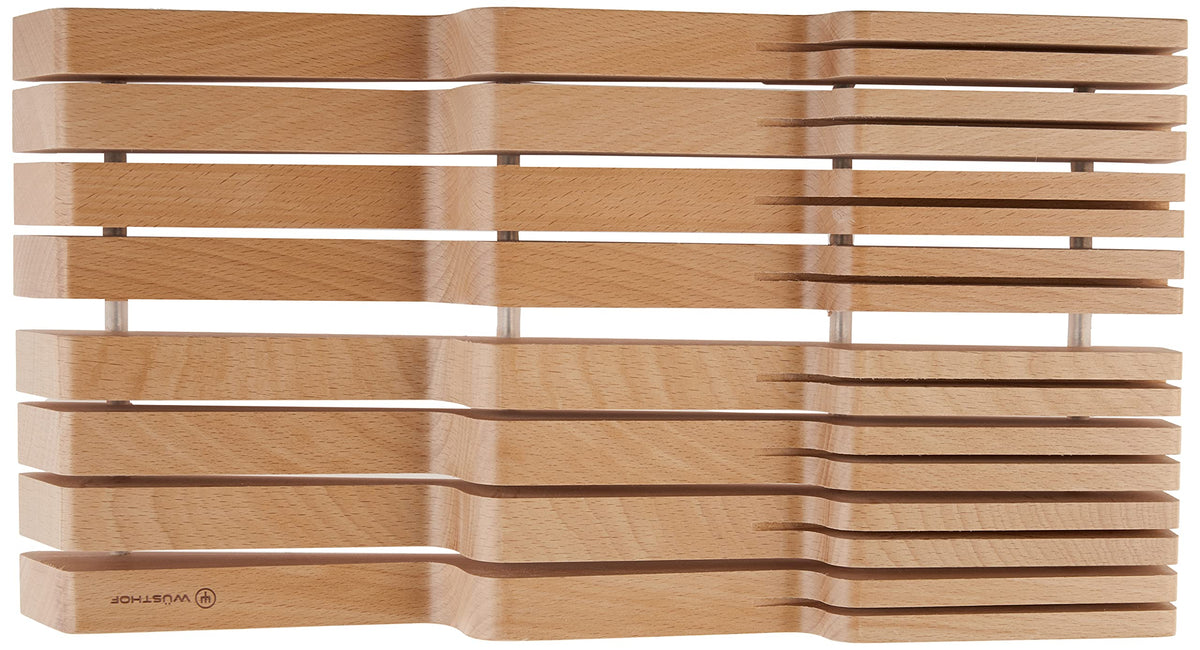 WÜSTHOF in-drawer knife storage blade slots fully cover blades for safety.