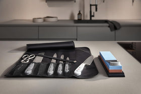 WÜSTHOF stainless kitchen shears cutting herbs and flowers for quick kitchen prep.