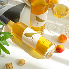 WUWEOT 750ml bottle showcased for homemade drinks and party favors