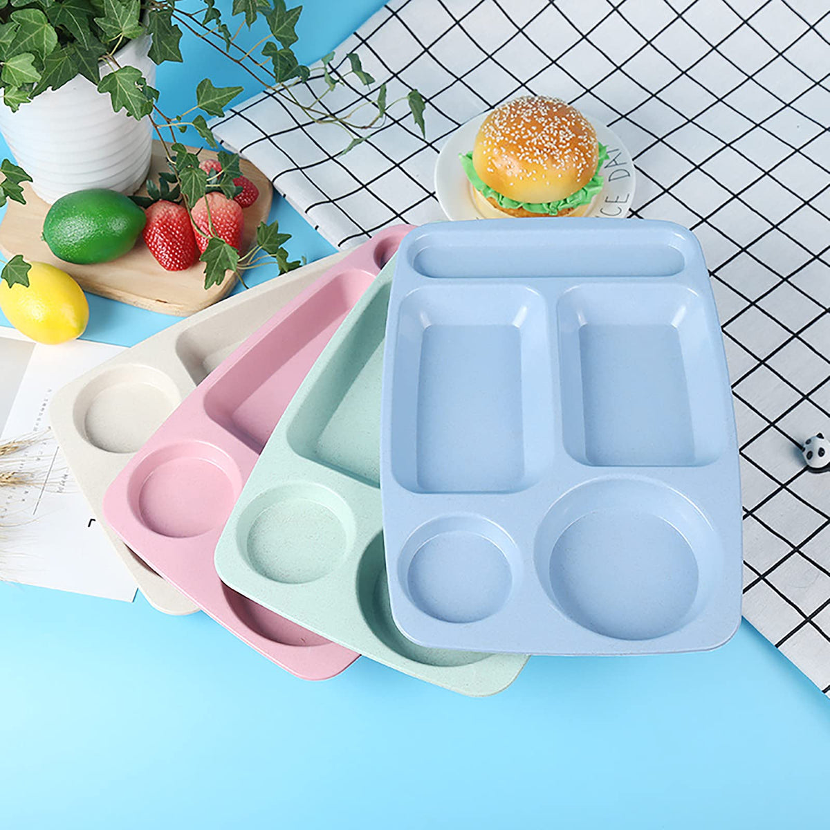WUWEOT eight-pack divided plates in green with five compartments.