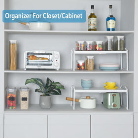 X-cosrack kitchen counter organizer in action with easy access to cups and spices.