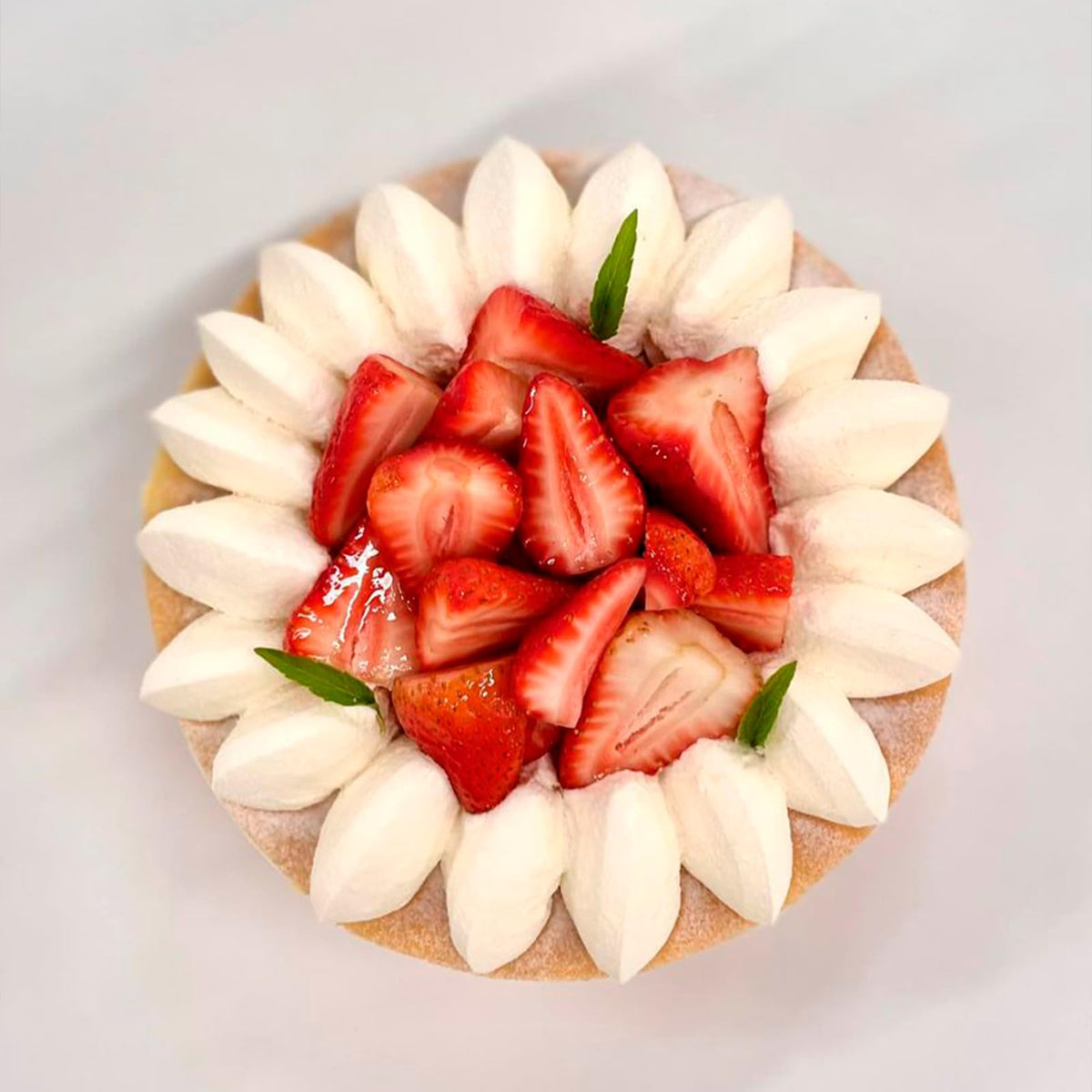 Xcake Lcook strawberry mold creates ice cubes for cool drinks.