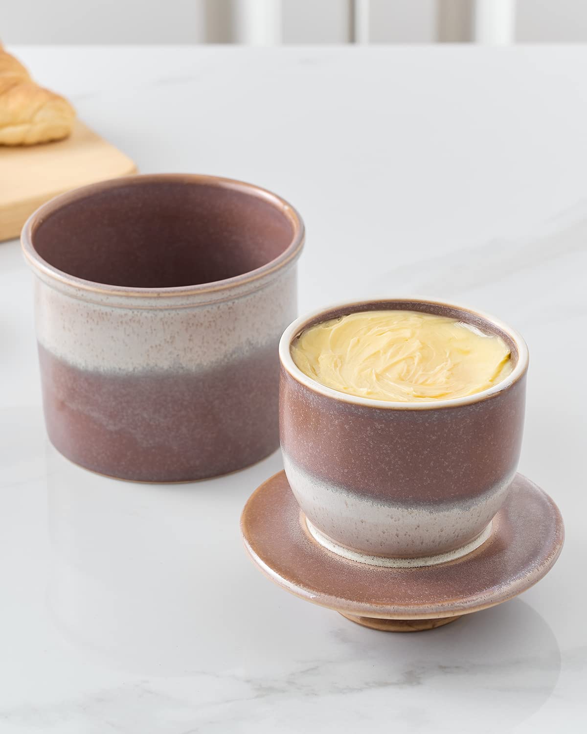 Two-tone reactive glaze on XELA butter crock adds table-ready style.