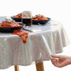 XFasten round table cloth cover on a 90-inch table protects from spills.