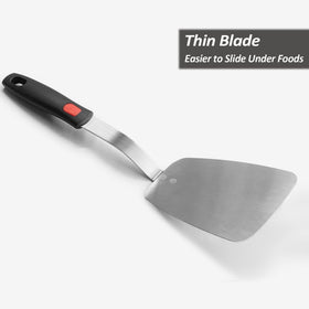 XiaoZu spatula with heat-resistant silicone handle for safe edge use.