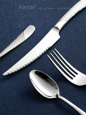 Xideman table setting showcases modern hammered cutlery aesthetics